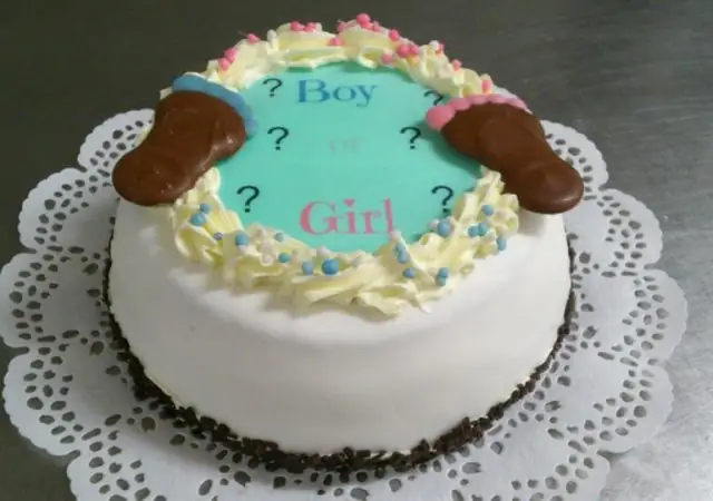Witte boy or girl-taart met de vraag Boy of Girl in blauw en roze